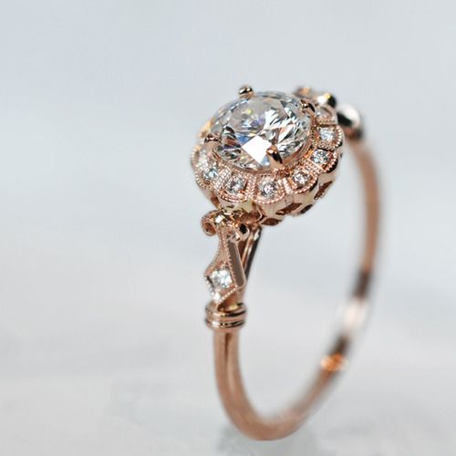 This is so pretty it hurts. Rose gold and diamond. The prettiness of this ring makes it a show stopping piece. 