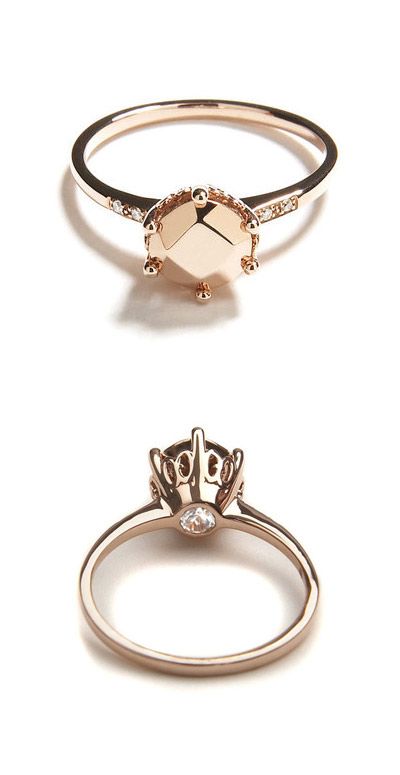 This is a gorgeous alternative to your traditional solitaire. Champagne stone and rose gold, amazing. What is even more amazing is that the diamond is on the underside of the stone for only you and your other half to know about. Such a pretty thought!