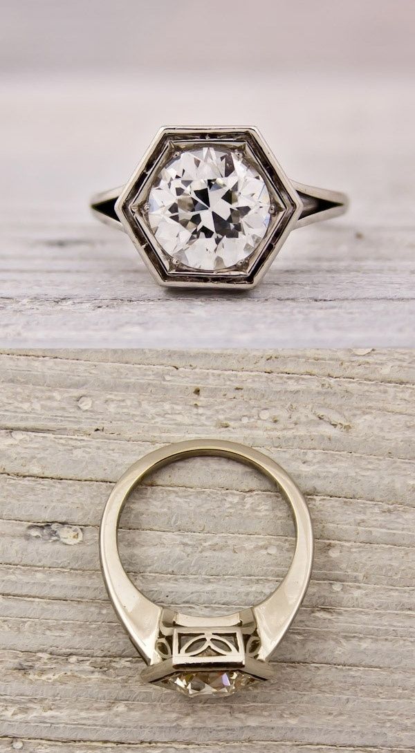 This geometric Roman inspired ring carries a cool 1.75 carat stone. 